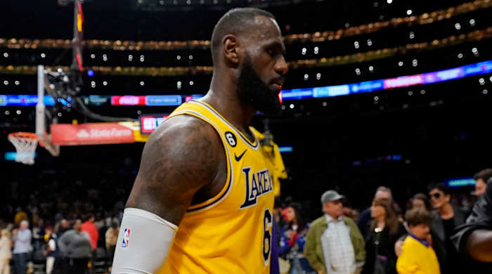 Lakers forward LeBron James walks off the court after Game 4 loss to Nuggets